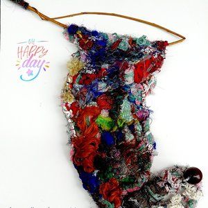 Original fish symbol handmade multi colored wall hanging